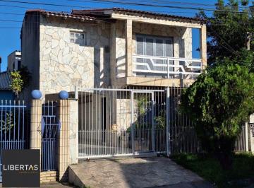 Casa · 200m² · 3 Quartos · 2 Vagas · Casa com 3 dormitórios, suíte, lareira, Jardim Algarve em Alvorada - RS.