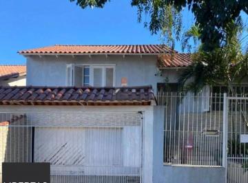 Casa · 125m² · 3 Quartos · 2 Vagas · Casa com Duas Residências e Pátio Amplo no Bairro Tranquilo