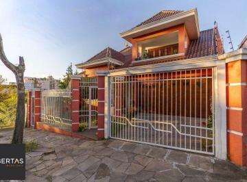 Casa · 297m² · 4 Quartos · 3 Vagas · Casa de 3 quartos, 1 suíte e 3 vagas de garagem em Canoas