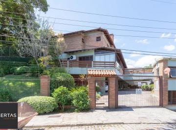 Casa · 204m² · 3 Quartos · 2 Vagas · Casa em condomínio fechado para venda no bairro Jardim Isabel, com aproximadamen