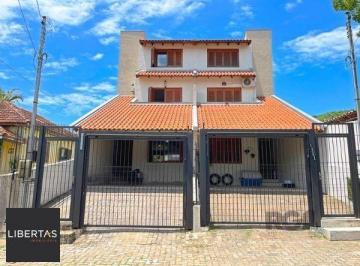 .jpg+2025-03-04 · Casa em Porto Alegre, no bairro Tristeza, com 3 dormitório(s), e 3 banheiros, à