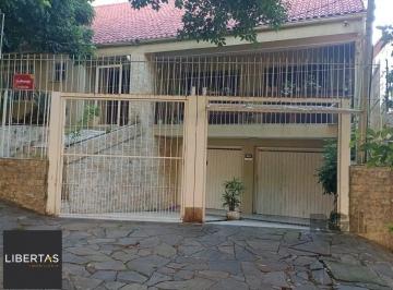 Frente+Casa.jpg+2025-04-10 · Casa 3 dormitórios à venda Santo Antônio Porto Alegre/RS