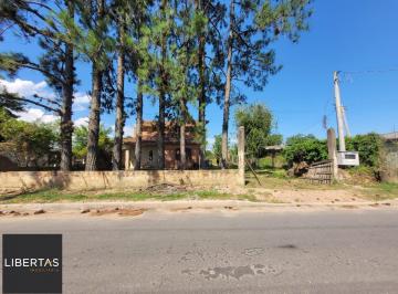 .jpg+2025-05-30 · Ótimo terreno com casa na Ponta Grossa.