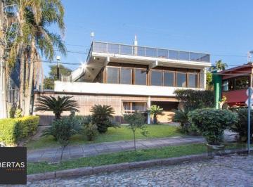 Casa · 375m² · 3 Quartos · 4 Vagas · Casa em condomínio que possui  3 dormitórios, sendo 1suíte, lavabo, escritório,
