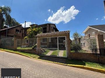 Casa · 190m² · 4 Quartos · 3 Vagas · Residência de Luxo no Cantegril com 4 Dormitórios, 2 Suítes, Piscina e Espaço Go