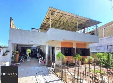 Fachada da casa 2 · Casa à venda - em Cavalhada