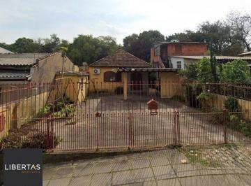 Casa · 70m² · 3 Quartos · 4 Vagas · Excelente imóvel com terreno amplo à venda no Jardim Itu – Porto Alegre