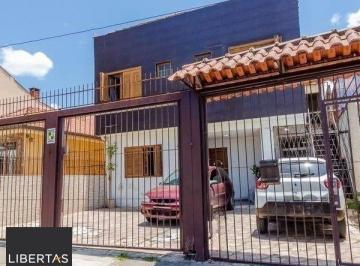 Casa · 296m² · 4 Quartos · 3 Vagas · Casa sobrado no Partenon de 4 dormitórios e 2 vagas