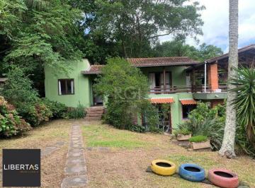 Casa · 200m² · 3 Quartos · 4 Vagas · Terreno de 5.280 m², com 3 casas, no bairro Ponta Grossa, em Porto Alegre.