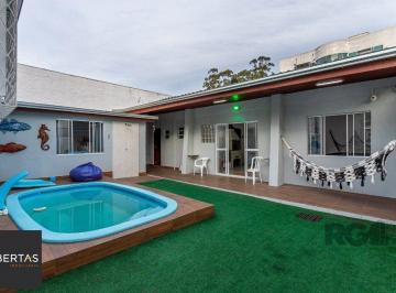 Casa · 157m² · 3 Quartos · 4 Vagas · Casa no Jardim do Salso de 3 dormitórios pátio e piscina