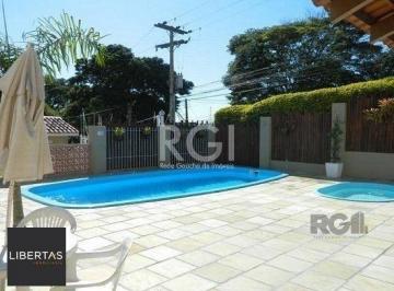 Casa · 96m² · 3 Quartos · 1 Vaga · Casa em condomínio no Partenon de 3 dormitórios e vaga