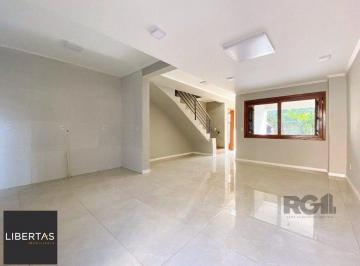 sala · Casa de 3 dormitórios no bairro Mário Quintana