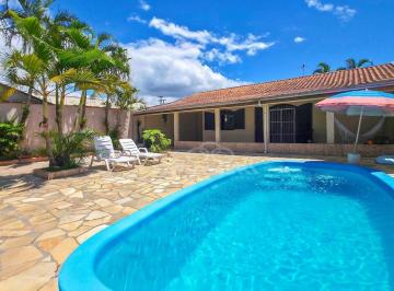e1724bd0d7a927c1017974f9a030e7337aea8fa2 · Casa com 4 dormitórios à venda, 150 m² por R$ 750.000,00 - Nereidas - Guaratuba/PR
