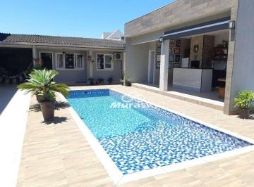 ee1b9a194cb198dec1626e93b5f35d36ec135856 · Casa com piscina e 3 quartos à venda, 182 m² por R$ 790.000 - Cohapar - Guaratuba/PR