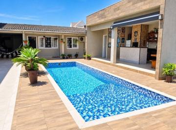 74f36e64d4861ec82446cbb78bbd3a97133b0731 · Casa com piscina e 3 quartos à venda, 182 m² por R$ 840.000 - Cohapar - Guaratuba/PR