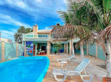 d287058364abd1d41936f70248f884cf2e72d299 · Casa com 4 dormitórios à venda, 230 m² por R$ 850.000,00 - Coroados - Guaratuba/PR