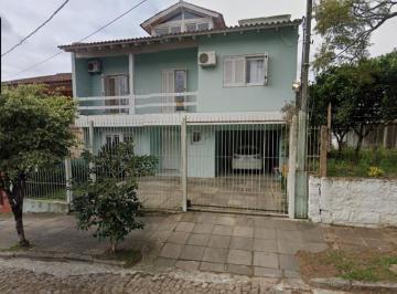 Casa · 4 Quartos · 2 Vagas · Imóvel com Piscina em Espírito Santo, Porto Alegre - Casa à venda com 200m² de área