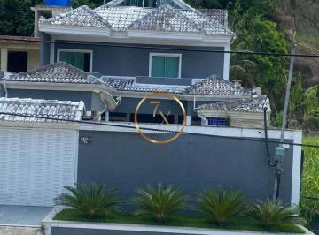 Casa · 700m² · 4 Quartos · 1 Vaga · Refúgio de Luxo no Coração de Vargem Grande: Casa de Alto Padrão com 4 Suítes e Lazer Completo em Te