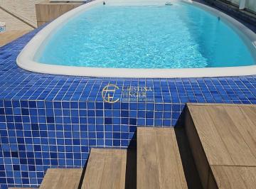 Casa · 249m² · 3 Quartos · 2 Vagas · Casa à venda na Praia da Pinheira | 3 suítes, piscina e excelente padrão construtivo
