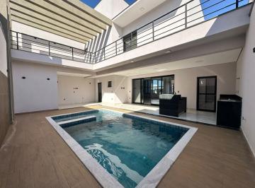 Casa · 307m² · 3 Quartos · 4 Vagas ·
Sobrado com 3 Suítes, Closet e Piscina à Venda no Condomínio Dona M
