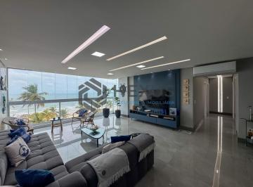 Foto · Apartamento reformado frente mar com varanda vista mar nas Pitangueiras, Guarujá