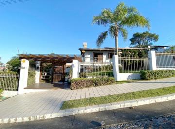 Casa · 204m² · 4 Quartos · 3 Vagas · Mansão em Torres com amplo pátio e gourmet com piscina