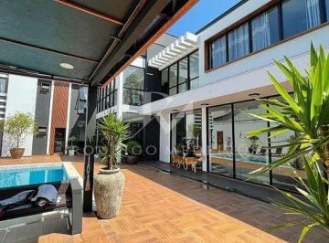 casa-com-4-quartos-a-venda-760m-no-estreito-florianopolis-2-1783014356346.webp · Casa com 4 suítes e vista mar no Estreito, Florianópolis