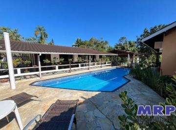 Foto 01 · Casa alto padrão à venda em Ubatuba, bairro Tabatinga. 4 suítes. Com piscina e area gourmet.