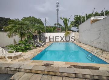 Foto · Casa com varanda na região do Praia do Pernambuco na Enseada, Guarujá