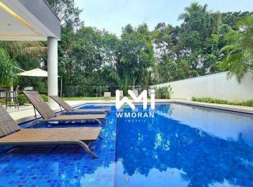 caf154b27b2ed613789d9b1d1e407a8944156d69 · Casa com 7 suítes à venda, 684 m² por R$ 14.950.000 - Riviera Módulo 12 - Bertioga/SP