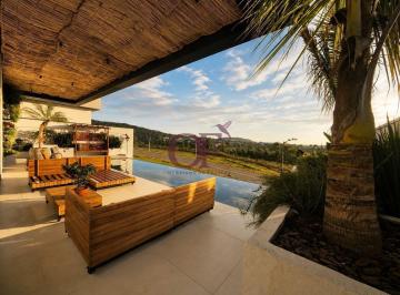 Casa · 440m² · 5 Quartos · 4 Vagas · Casa de Luxo com 5 Suítes, Cinema e Automação Completa em Condomínio Clube