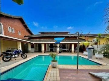 44fe9374c6ccd8cca1a8becfad4d452b5a4c93c7 · Casa com 3 dormitórios à venda por R$ 800.000,00 - Jardim Virginia - Guarujá/SP
