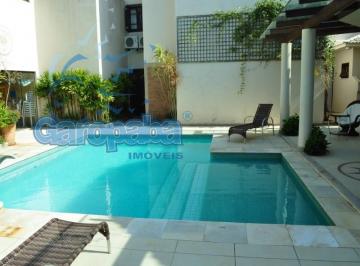 piscina compartilhada · Aluguel por Temporada: Casa em Condomínio de Luxo no Centro de Garopaba-SC, 1 suíte, banheiro, 1 va
