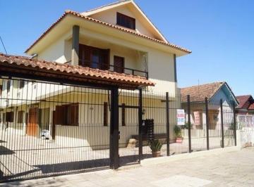 Casa · 173m² · 3 Quartos · 2 Vagas · Casa com 3 dormitórios sendo 1 suíte para locação no bairro Camaquã - Porto Ale