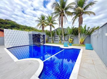 Foto · Casa reformada com piscina e área gourmet no Jardim Acapulco, Guarujá