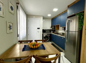 Apartamento · 57m² · 2 Quartos · 1 Vaga · Apartamento Moderno com Suíte e Área Privativa em Condomínio com Piscina ? Santo