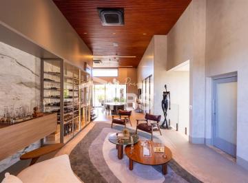 Casa · 411m² · 5 Quartos · 4 Vagas · Casa térrea mobiliada à venda no Jardins Itália, com 734 m² de terreno e 411 m² de área construída.