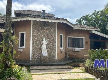 Foto 01 · Casa com 4 dormitórios, sendo 3 suítes, com piscina, Jacuzzi, forno a lenha e churrasqueira. Condomí