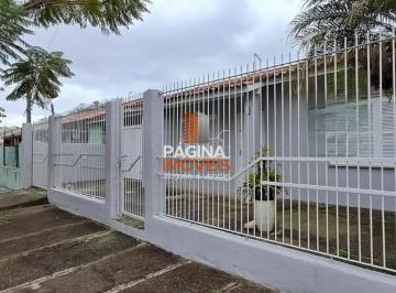 Casa · 60m² · 3 Quartos · 3 Vagas · Pagina 1 Imóveis anuncia para aluguel casa com 3 dormitórios, no Bairro Harmonia em Canoas/RS.