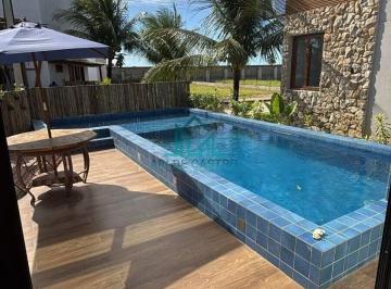 Casa · 315m² · 4 Quartos · 3 Vagas · Casa Duplex com 4 suítes, 315m², Mobiliada, Piscina e RoofTop à venda em Condomínio na Praia do Pata