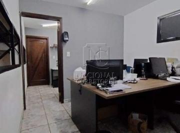 Comercial · 378m² · Terreno com galpão e mezanino com dois banheiros à venda no Bairro Jardim Santo