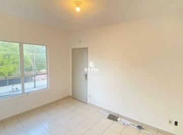Sala · Apartamento à venda no Jardim Independência em São Vicente.