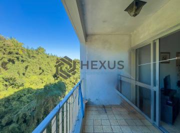 Foto · Apartamento com varanda na Praia do Tombo de 1 quarto com 1 vaga, Guarujá-SP.