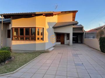 Casa · 177m² · 3 Quartos · 9 Vagas · Casa Térrea com Lareira e Móveis Planejados à Venda em Esteio