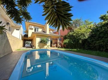 Casa · 164m² · 3 Quartos · 3 Vagas · Casa à venda em Novo Hamburgo - Boa Vista, com closet, hidromassagem e móveis planejados