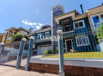 Casa · 240m² · 4 Quartos · 4 Vagas · Casa de 4 dormitórios, sendo 1 suíte e 4 vagas de garagem em Canoas.