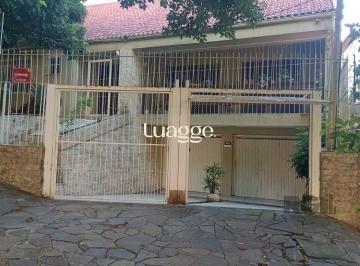 Frente+Casa.jpg+2025-04-10 · Casa 3 dormitórios à venda Santo Antônio Porto Alegre/RS