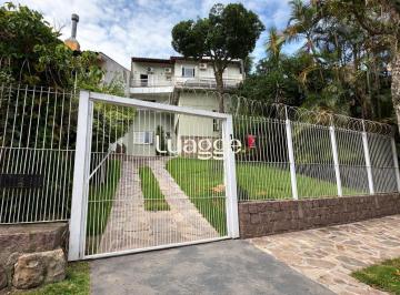 Casa · 500m² · 7 Quartos · 4 Vagas · Casa de 6 quartos com vista panorâmica para o Guaíba