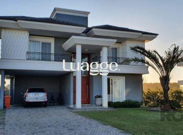 Casa · 300m² · 4 Quartos · 5 Vagas · Casa em condomínio fechado de luxo a beira-mar, no centro de Capão da Canoa/RS.