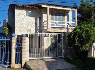 Casa · 200m² · 3 Quartos · 2 Vagas · Casa com 3 dormitórios, suíte, lareira, Jardim Algarve em Alvorada - RS.
